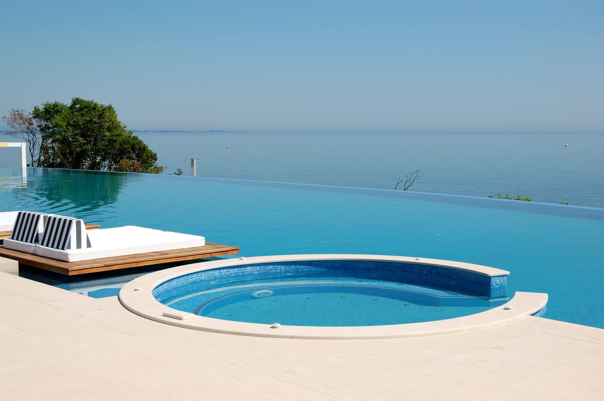 Infinity swimming pool with a spa pool